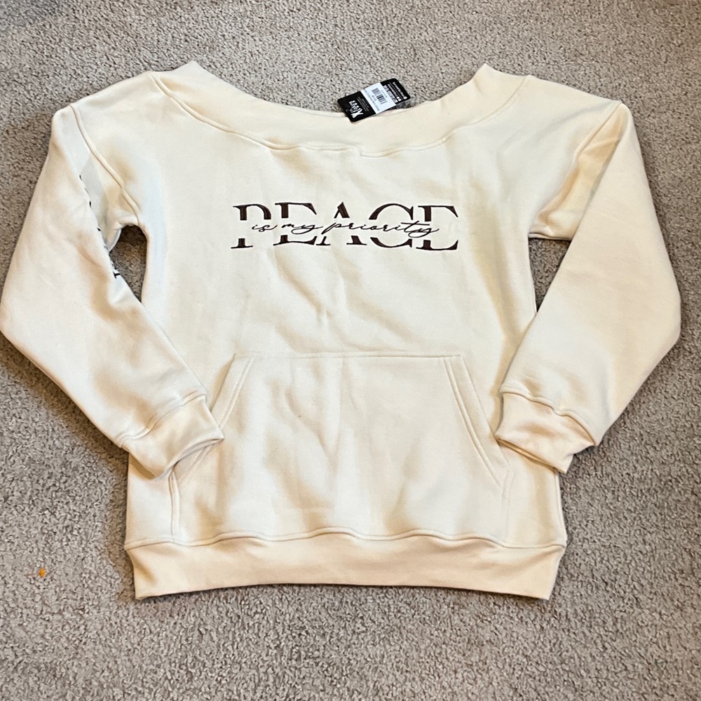 Off-Shoulder Cream Sweater with Peace Design